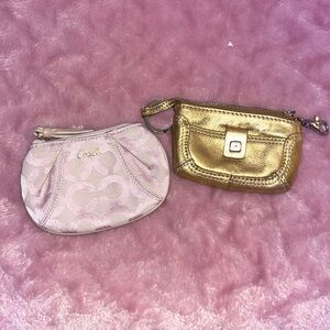One Michael kors and one coach coin purse